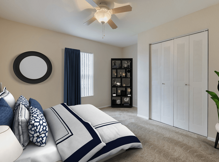 Virtually staged bedroom with  tan carpeted flooring throughout, window with white vertical blinds, and a bi-fold closet door on an adjacent wall